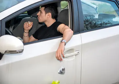 Tossing Litter from Car Window