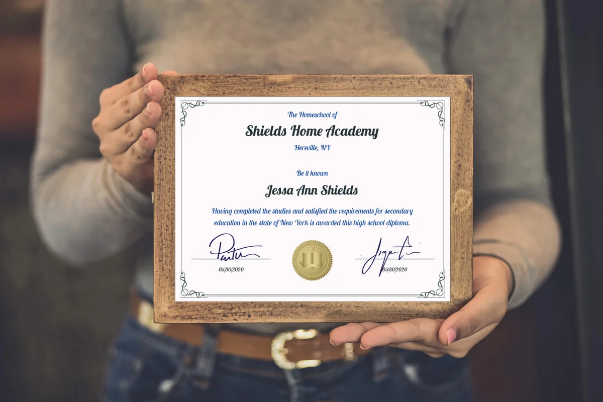 woman holding homeschool diploma