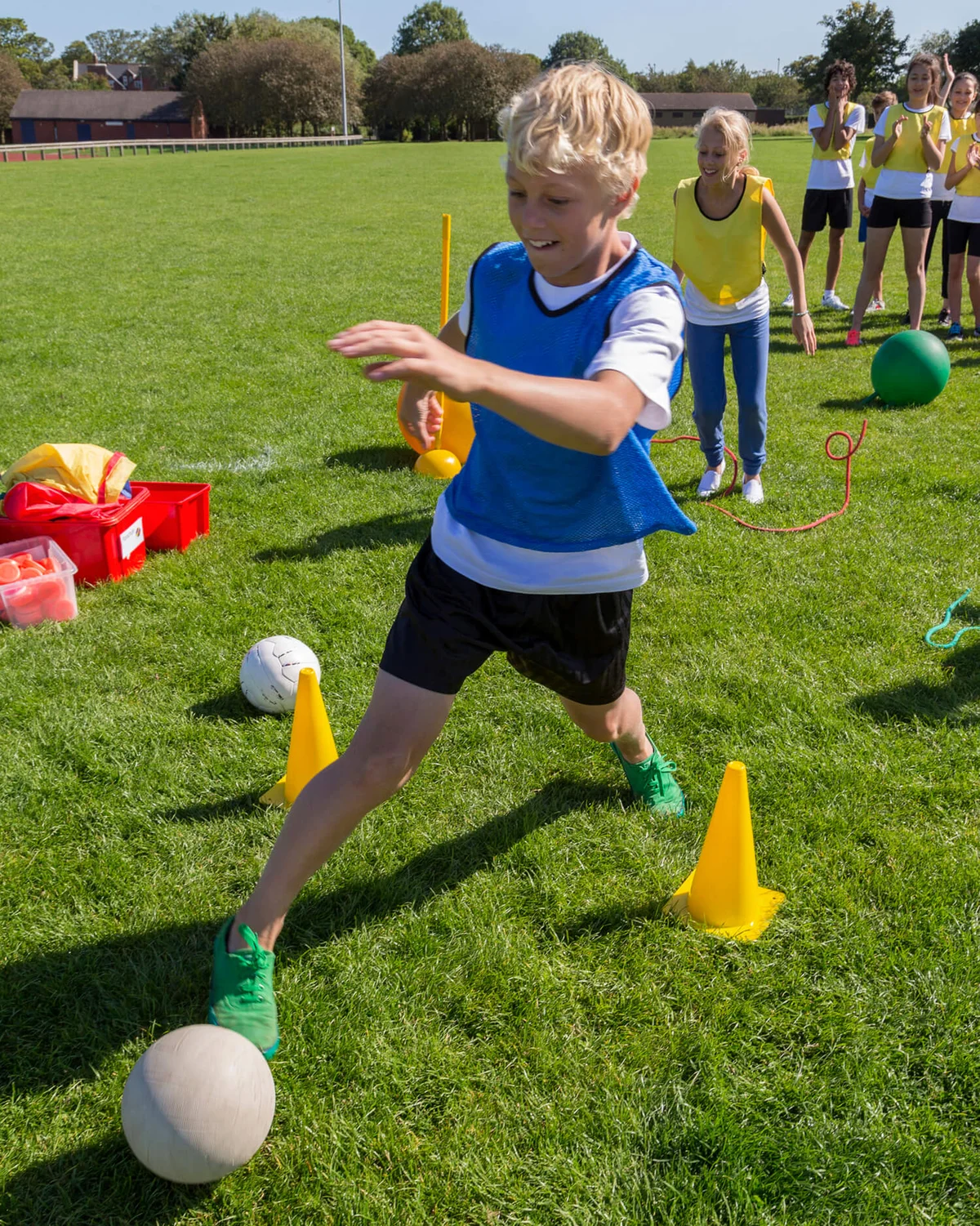 Young teens taking part in an obstacle course