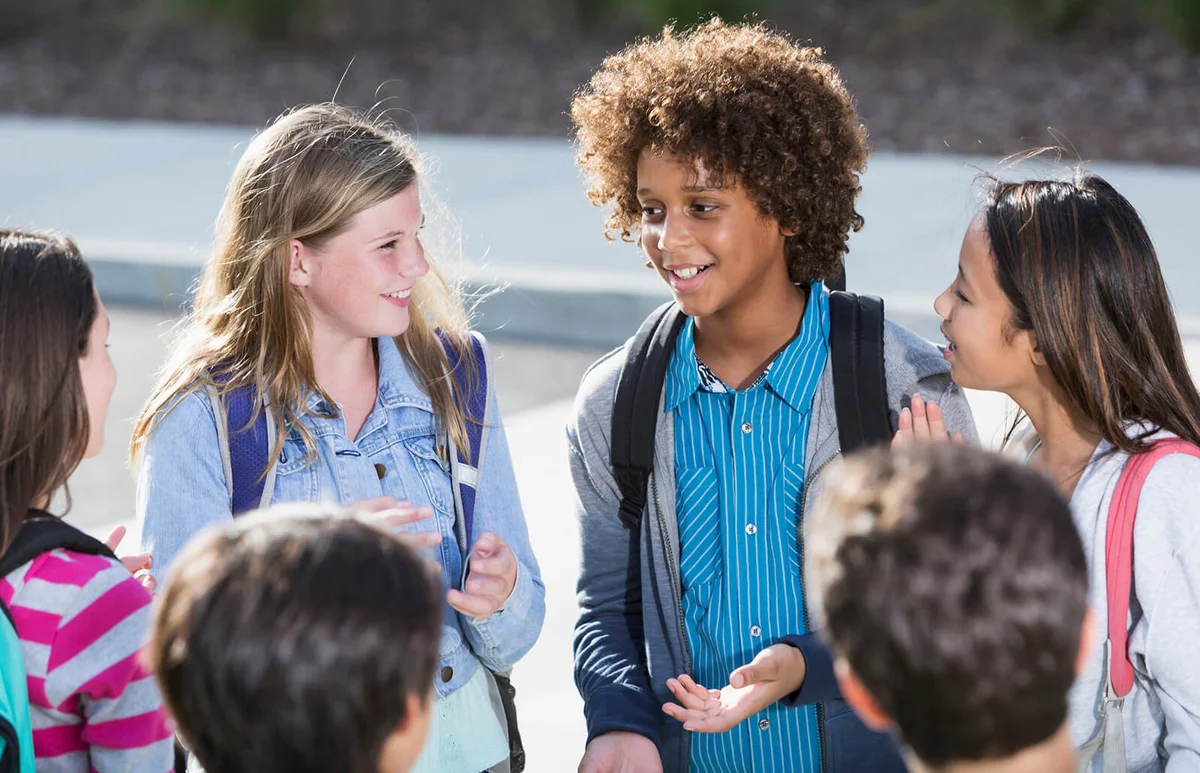 Students talking outdoors