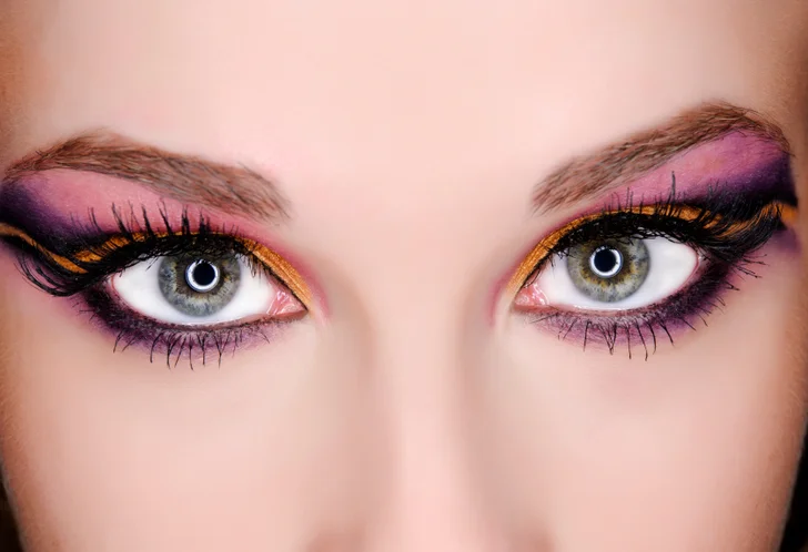 blue gray eyes with purple and copper eyeshadow