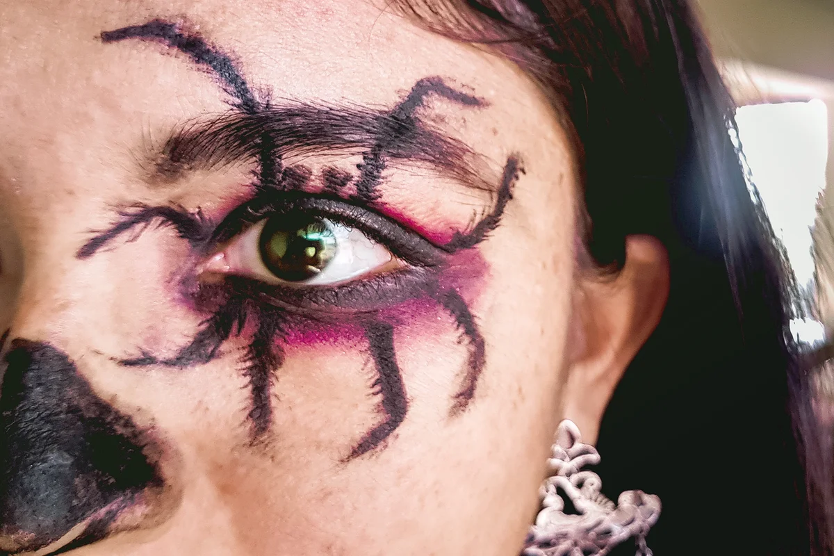 Woman With Spooky Spider Make-Up During Halloween