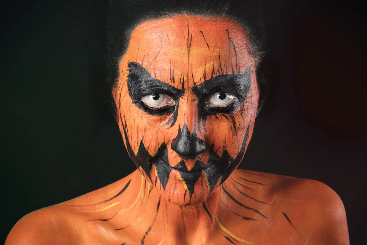 Creepy Jack-o'-lantern Make Up on Smiling Woman