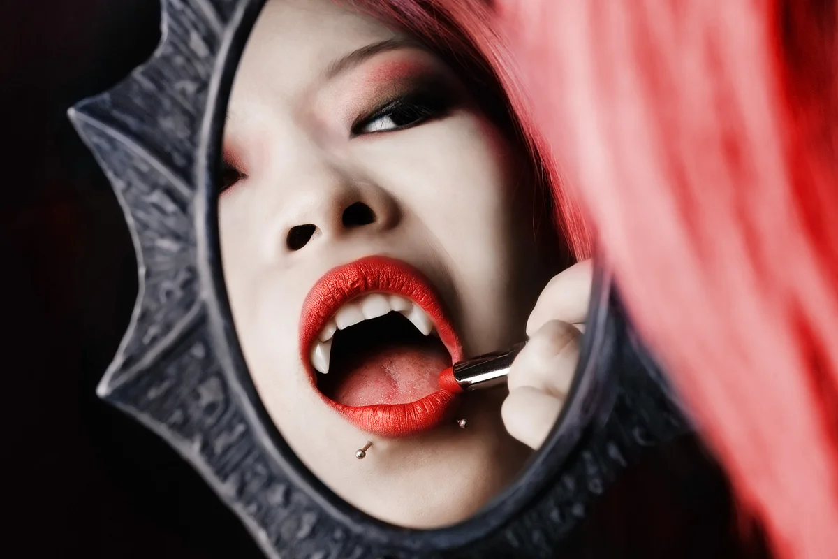 Vampire putting on her makeup
