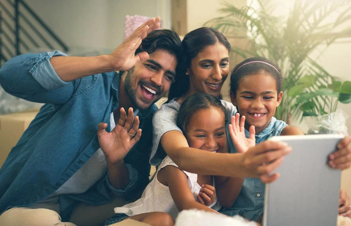 young family making a video call