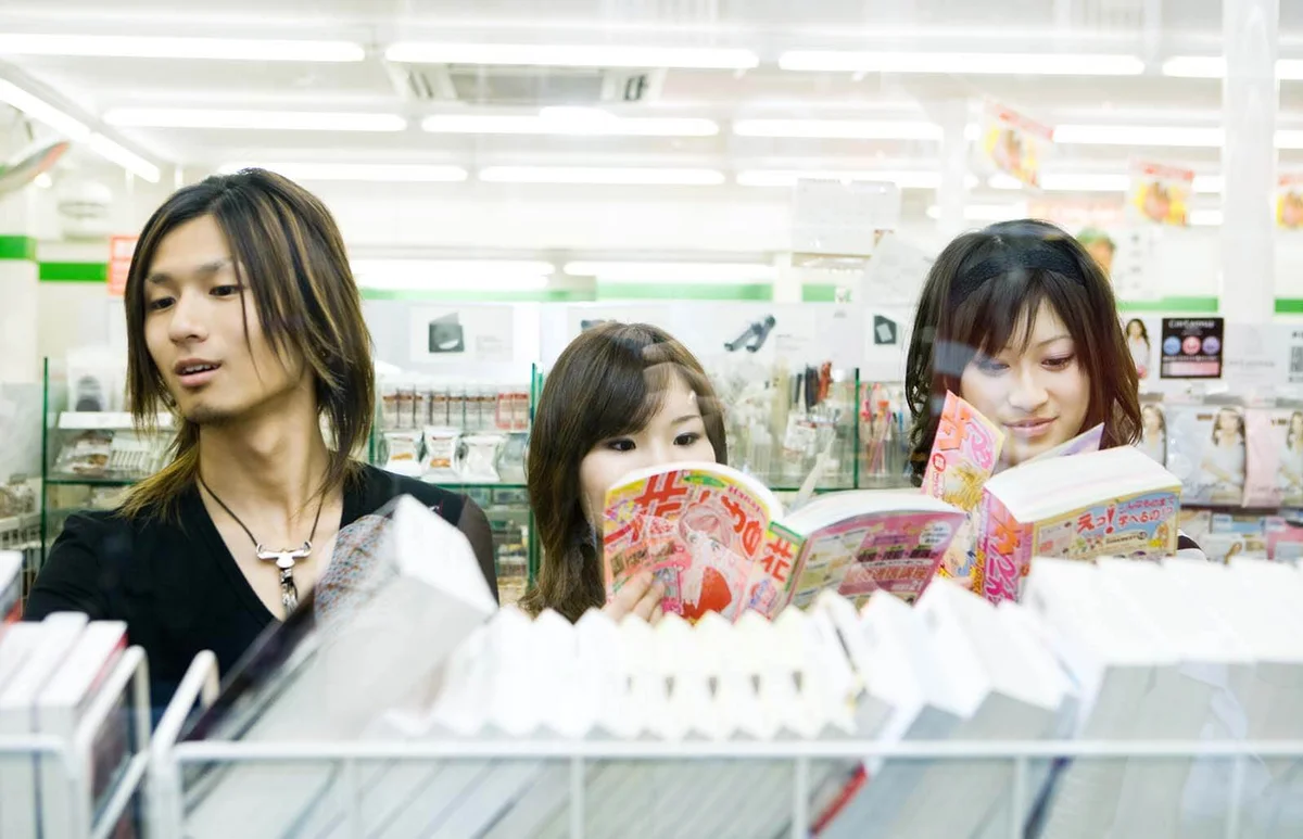 friends side by side in comic store