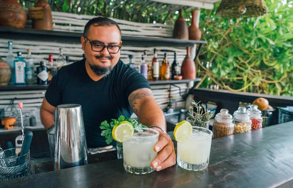 Bartender Serving Margarita's in Open Air Bar