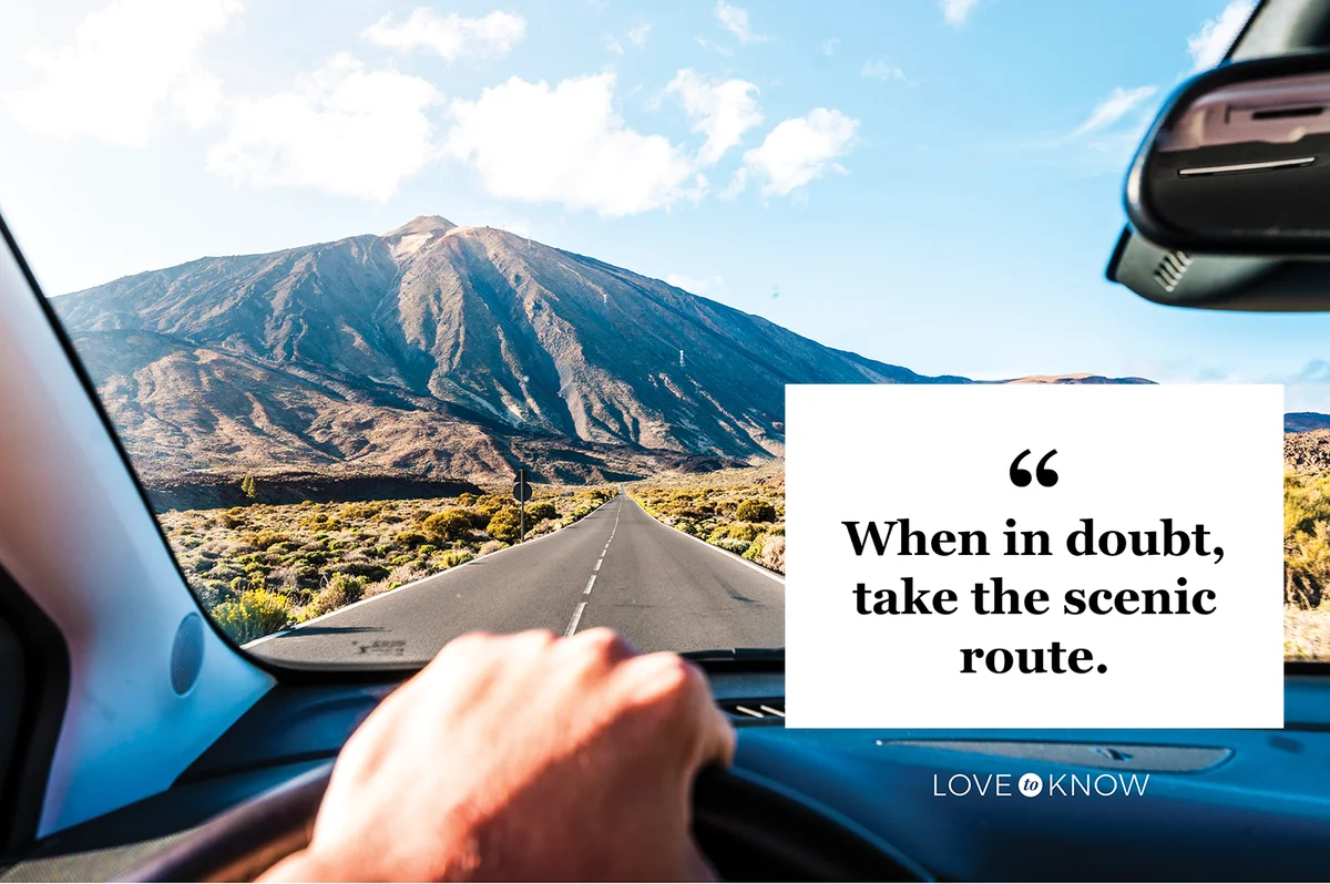 Person driving car in a beautiful mountain road