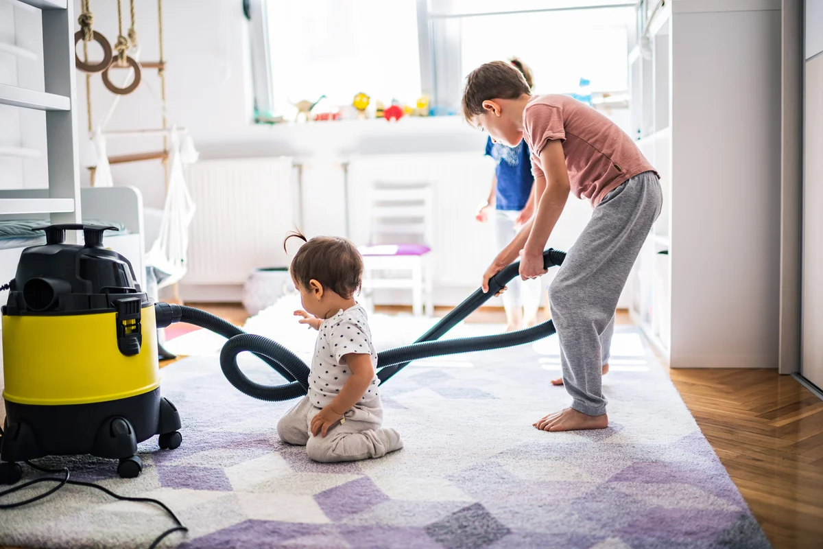 Children cleaning their room