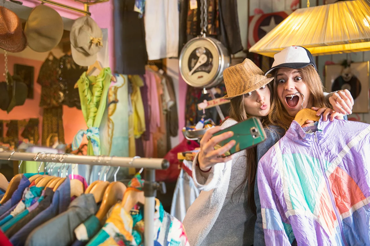 Friends taking selfie in thrift store