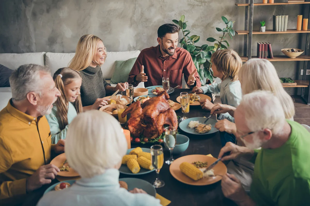 Family eating Thanksgiving Dinner