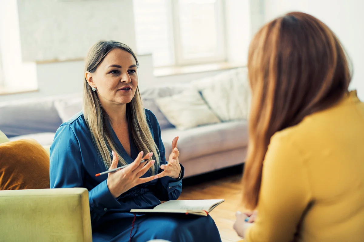 Psychologist practicing with patient