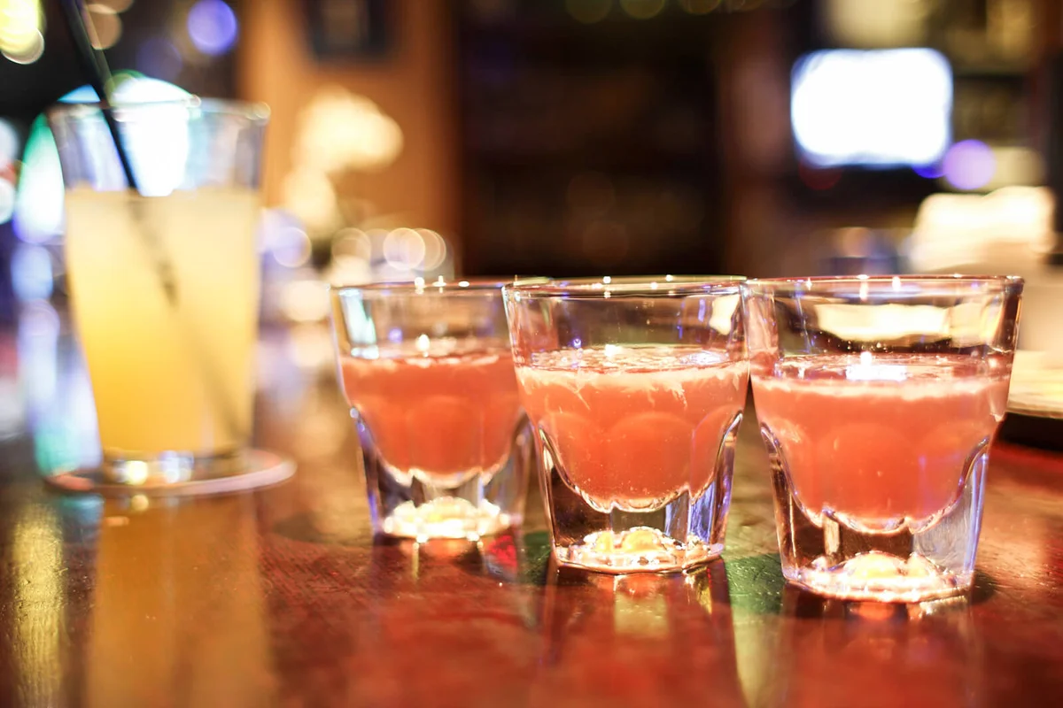Shots of alcohol and mixed drink at a bar | Photo 14299057 © Peter Kim | Dreamstime.com