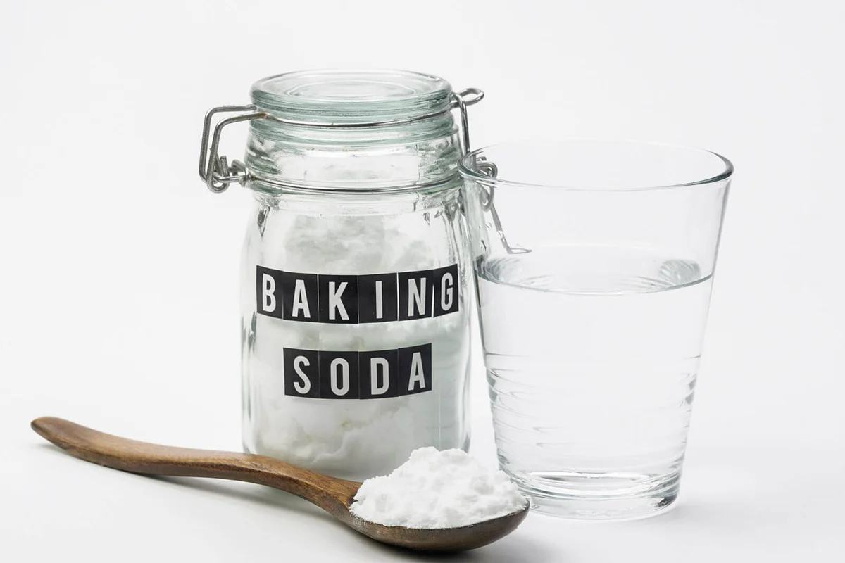 Baking Soda With Drinking Water On White Background