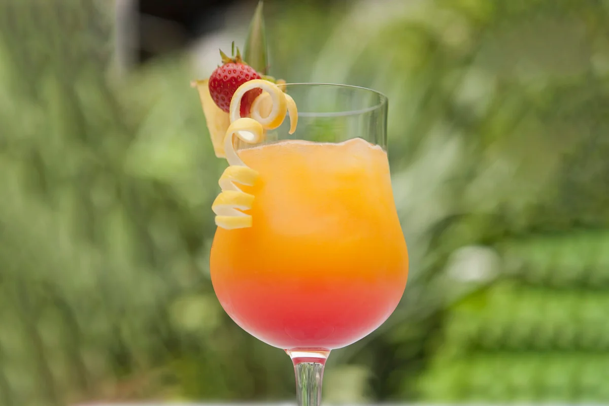 A fruit cocktail on a white table cloth