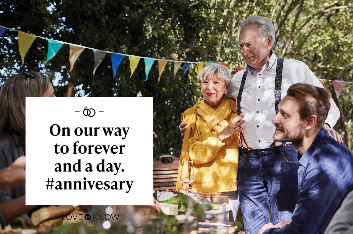 Happy senior couple hosting an anniversary garden party