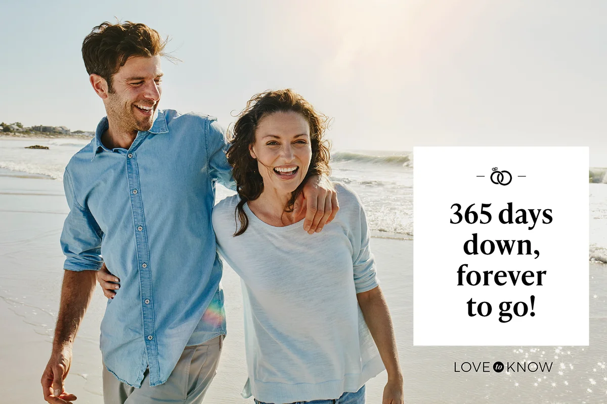 Laughing married couple on the beach