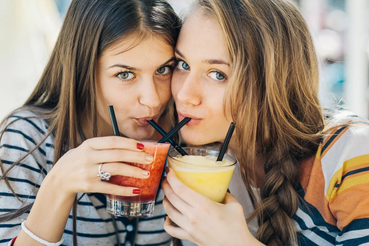 Teen girls drinking mocktails