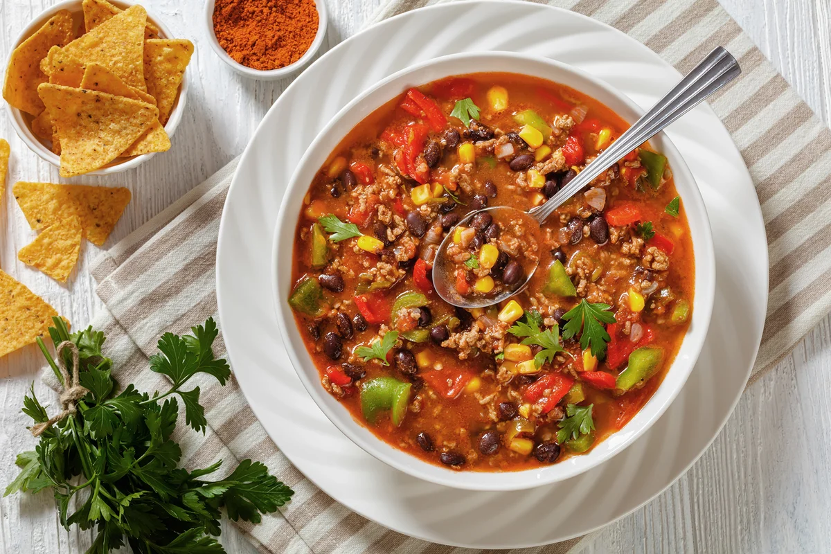 Taco soup of ground beef, corn, beans and veggies