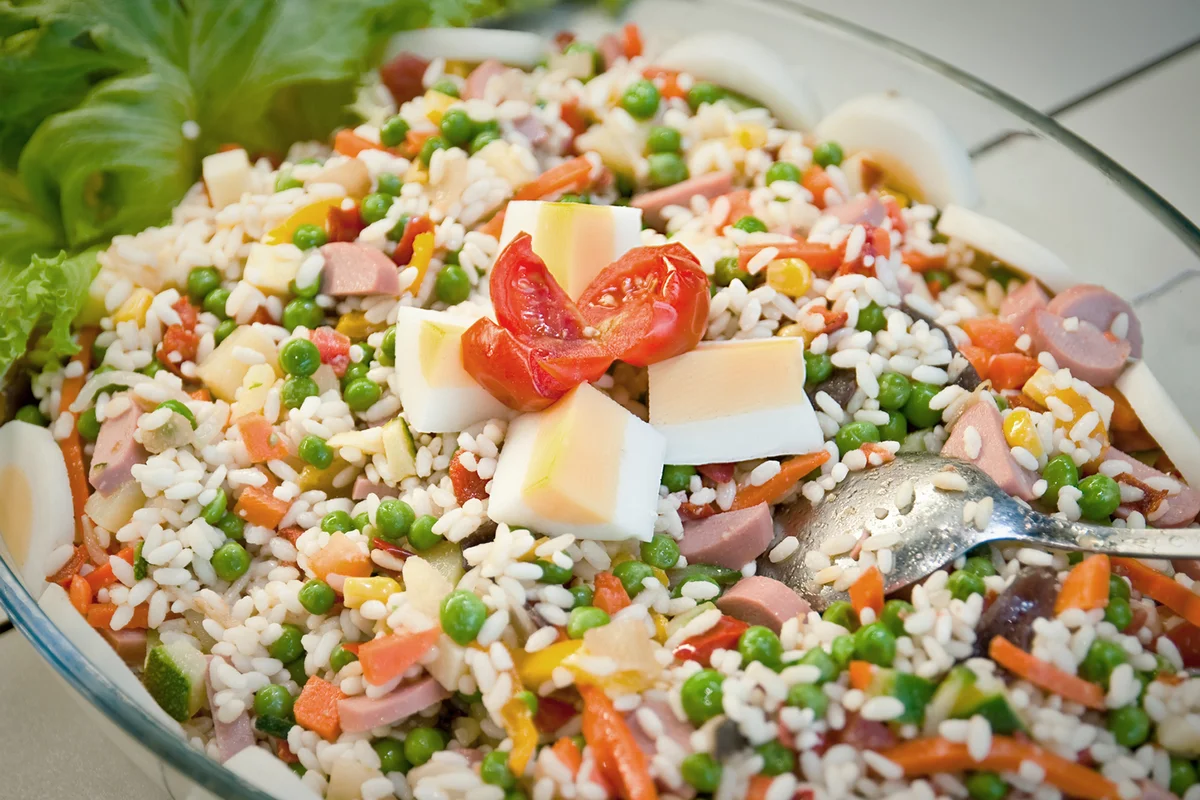 rice salad with tomatoes, eggs, peas, frankfurt, salad