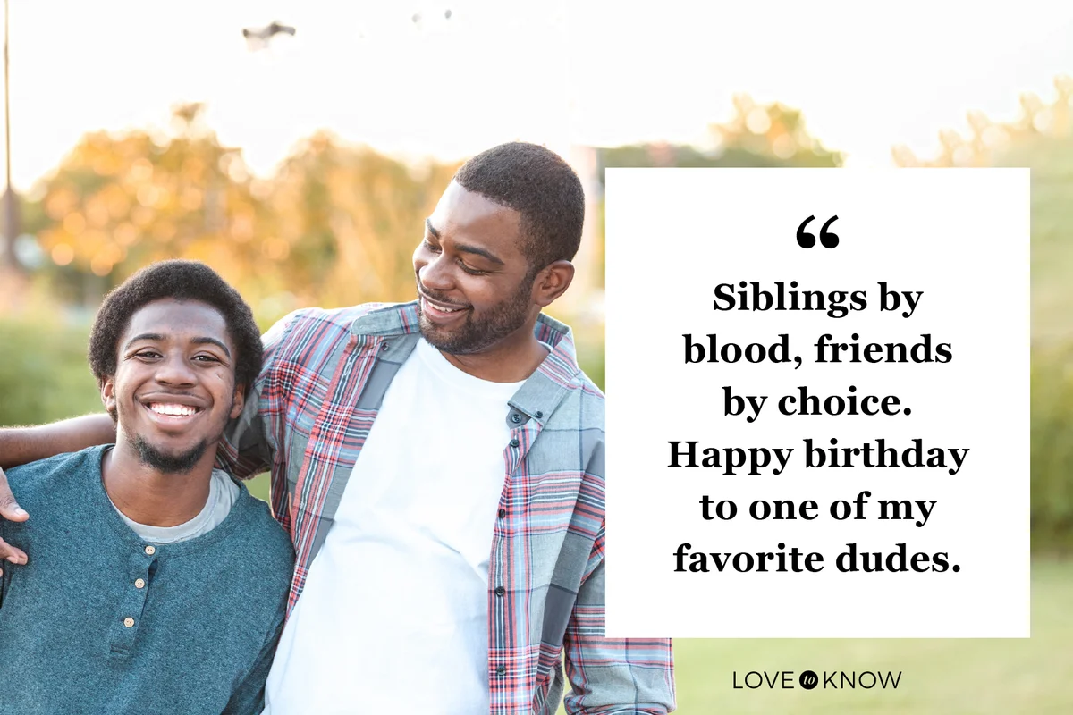Mid adult brother is proud of young adult brother