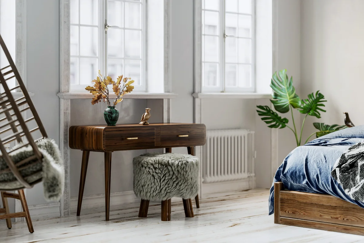 Bedroom with desk and backless seating