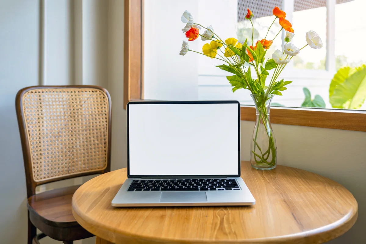 Laptop computer in a small table