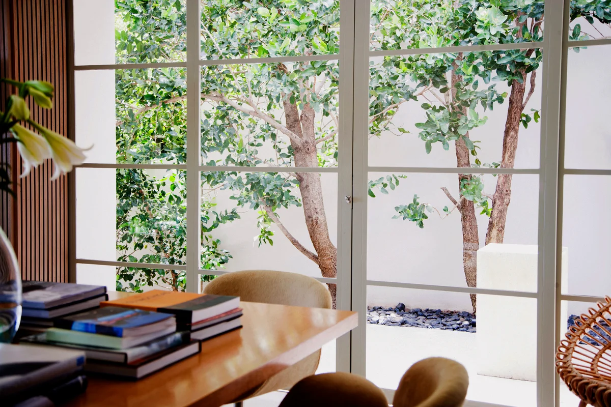 Room with big desk and window
