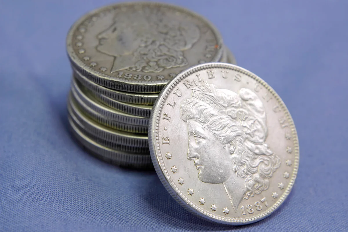 Close-up of a stack of old U.S. silver dollars from the late 19th century and early 20th century | Getty Editorial Use