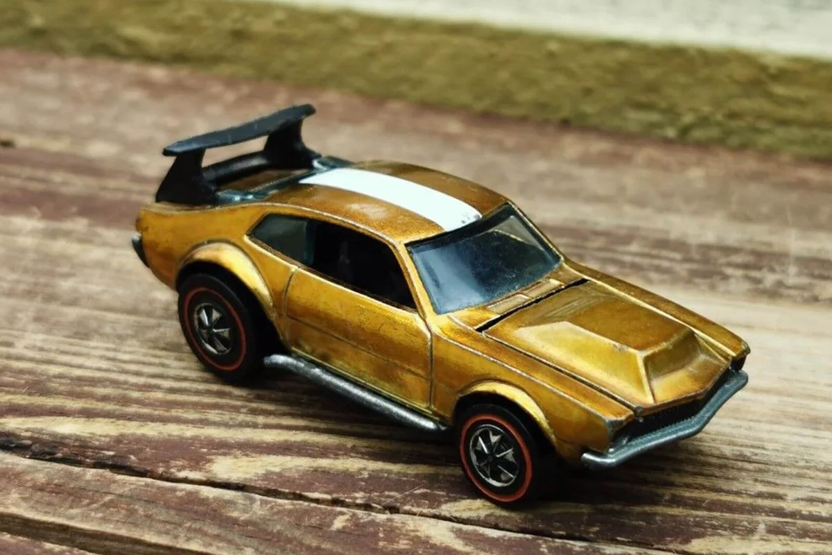 VINTAGE HOT WHEELS REDLINE MIGHTY MAVERICK GOLD COLOR WITH DARK INTERIOR
