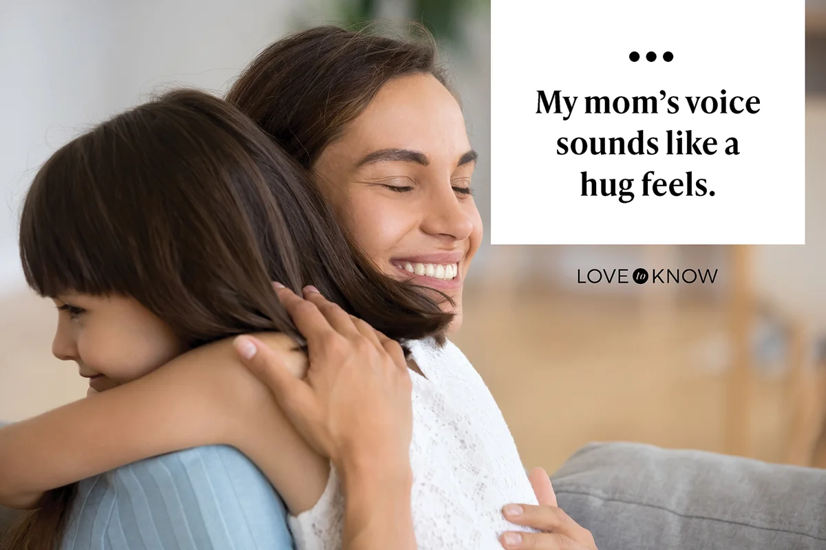 Mother hugging daughter expressing love and devotion