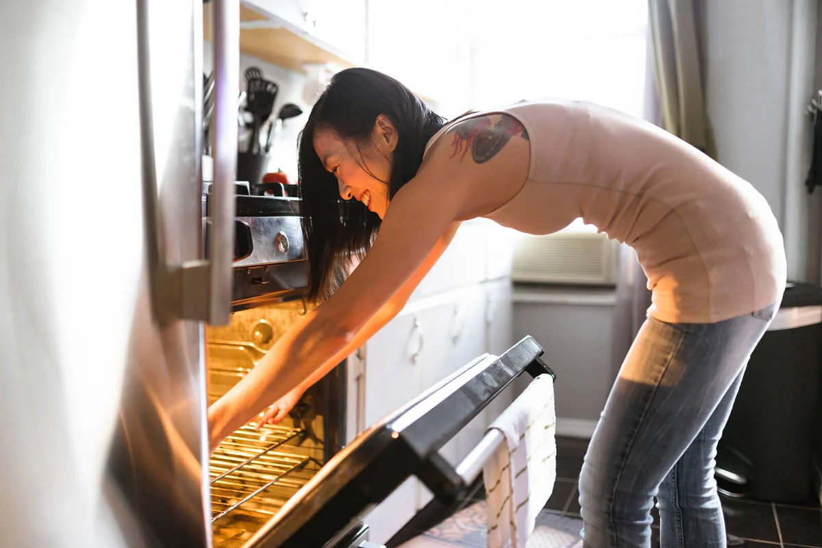 woman preparing food on the kitchen