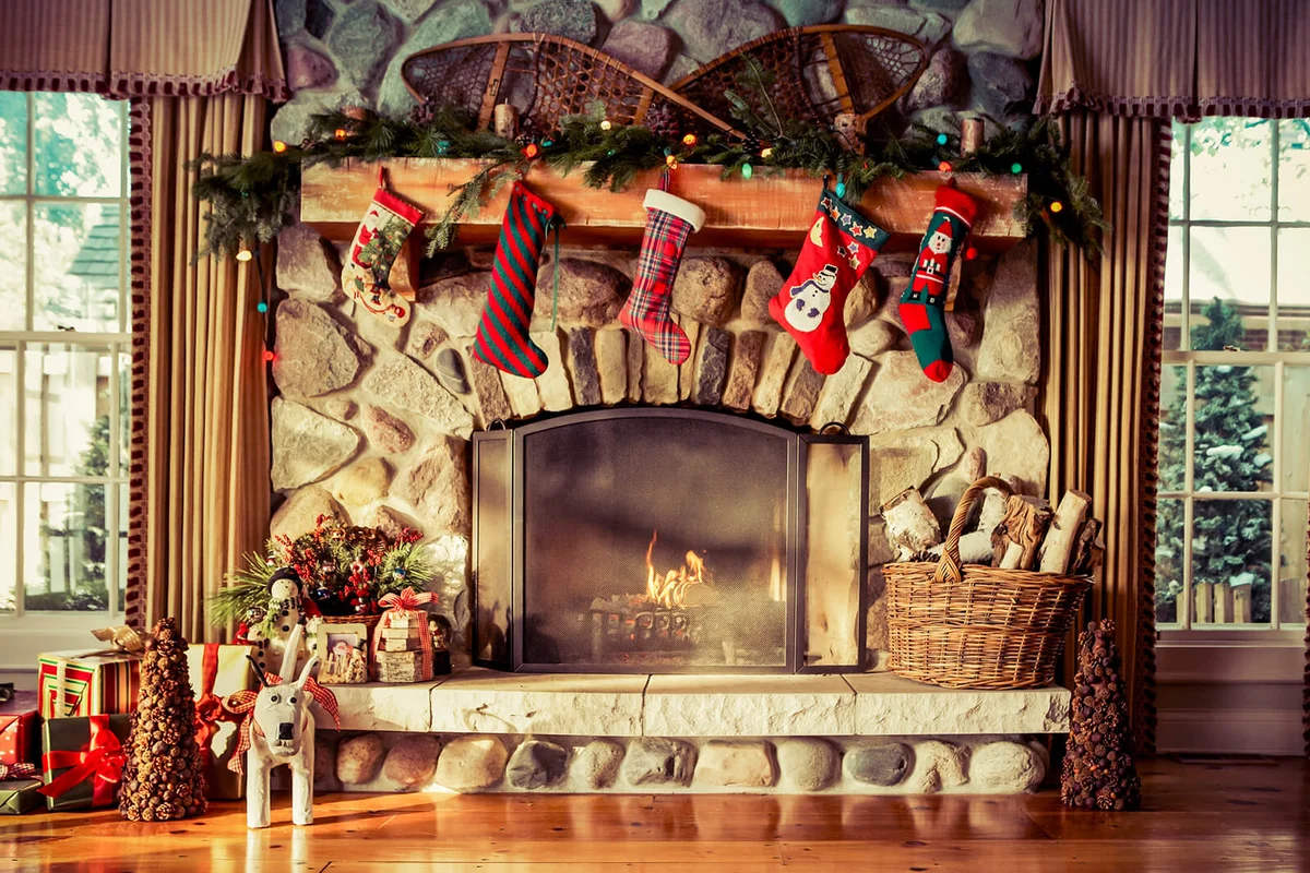 Stone fireplace decorated for Christmas