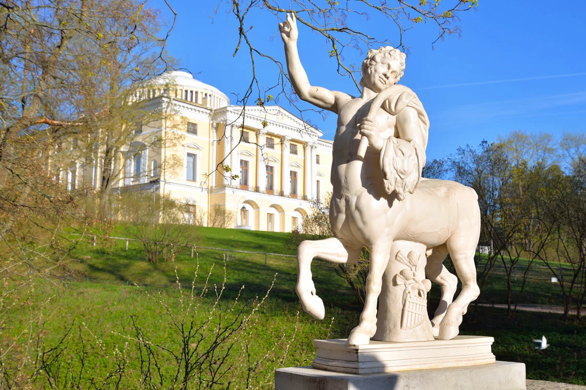 Centaur statue and Palace in Pavlovsk at sunny spring day