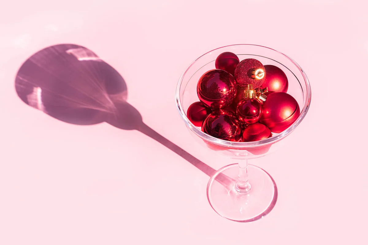 Christmas decoration red balls in cocktail glass
