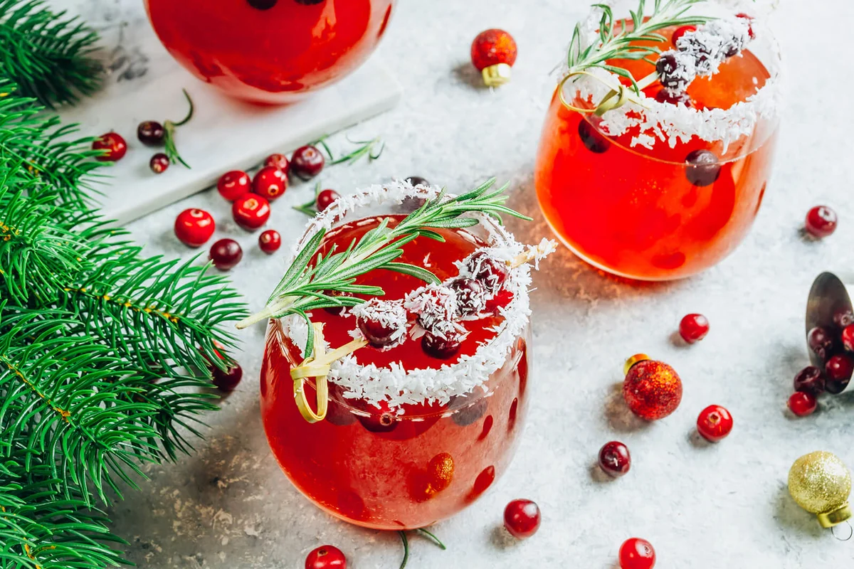 Festive Cranberry drink on Christmas background