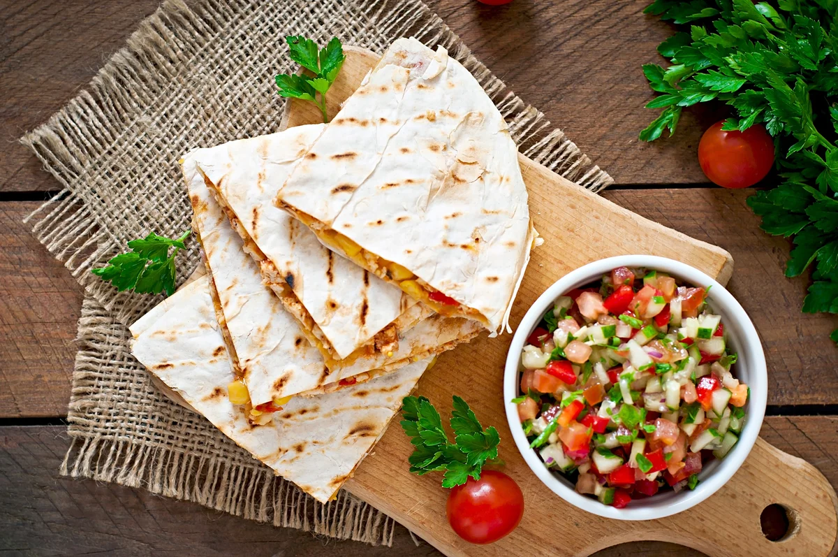Mexican Quesadilla wrap with chicken, corn and salsa