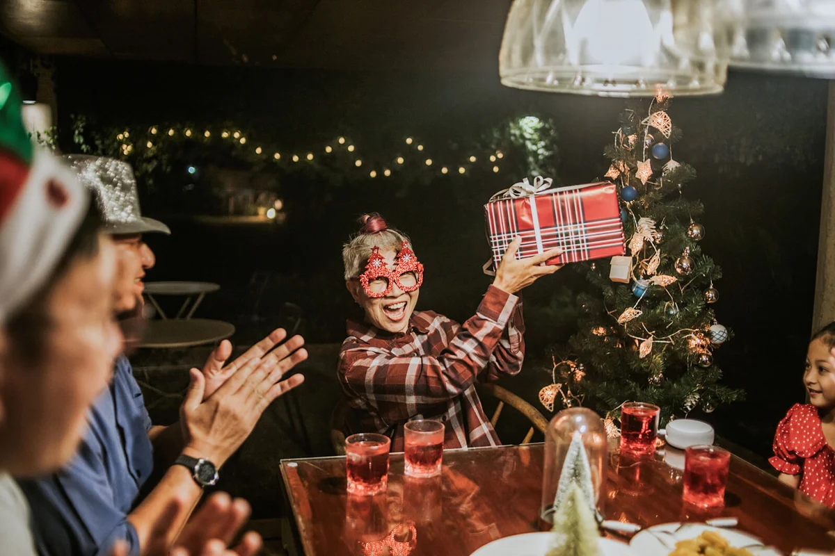 woman satisfaction with gift for Christmas