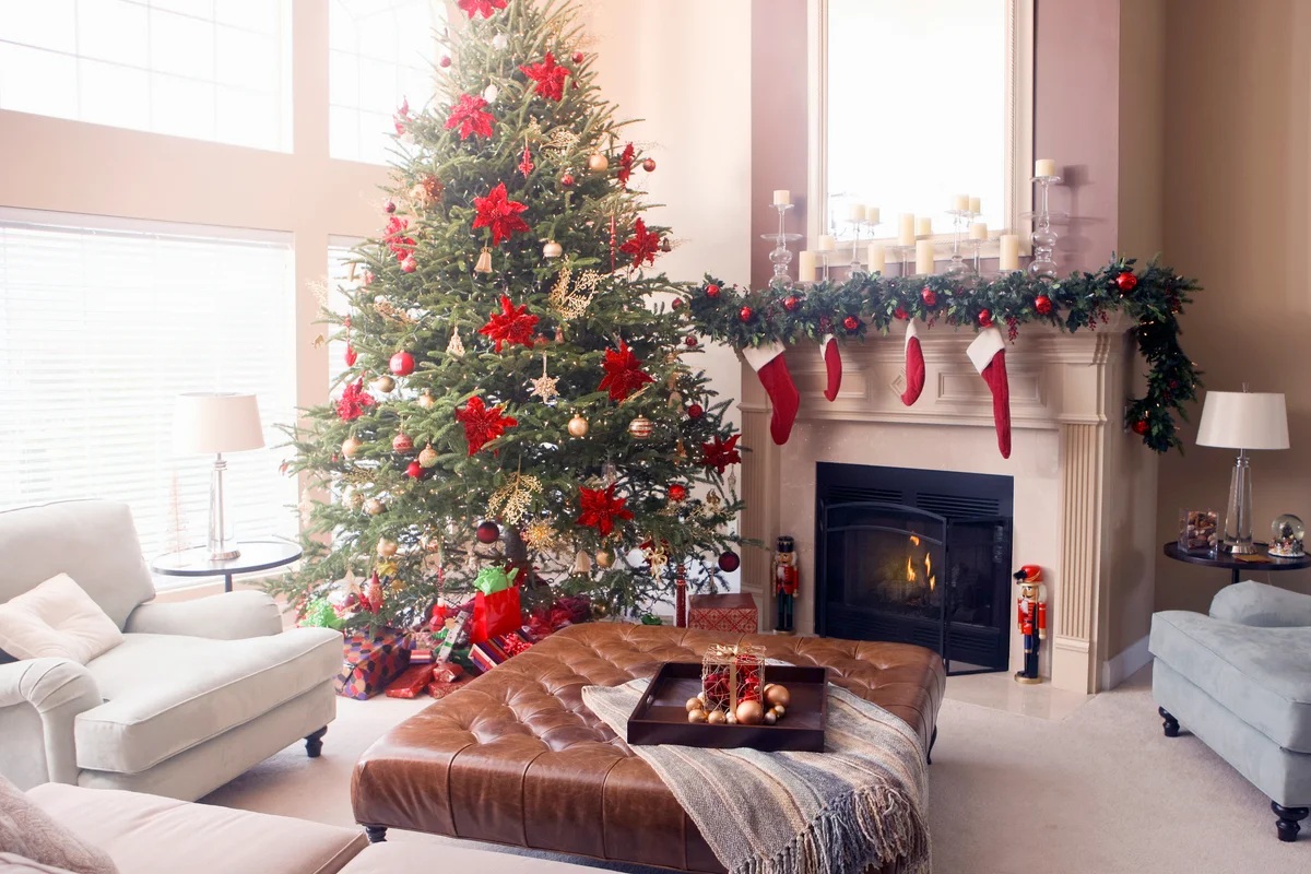 Christmas tree and decorations in living room in true red