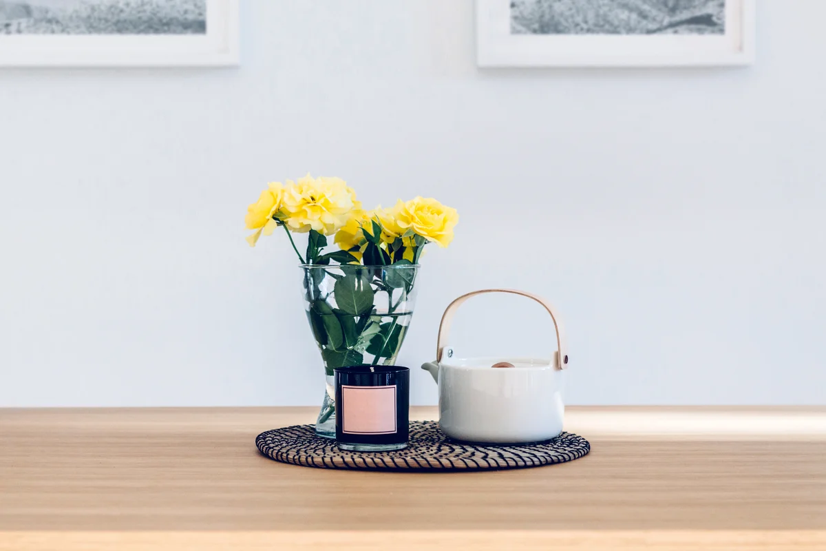 Grouping of three items used as table centerpiece