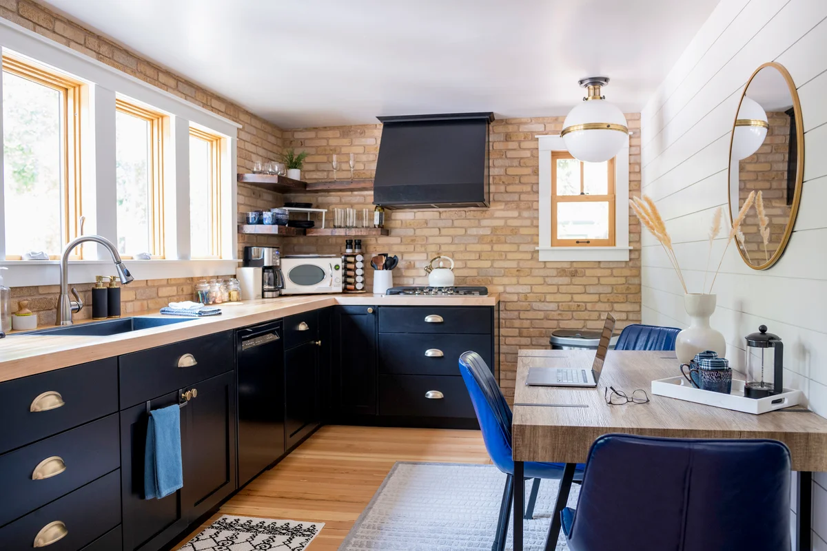 Kitchen with a mirror on wall