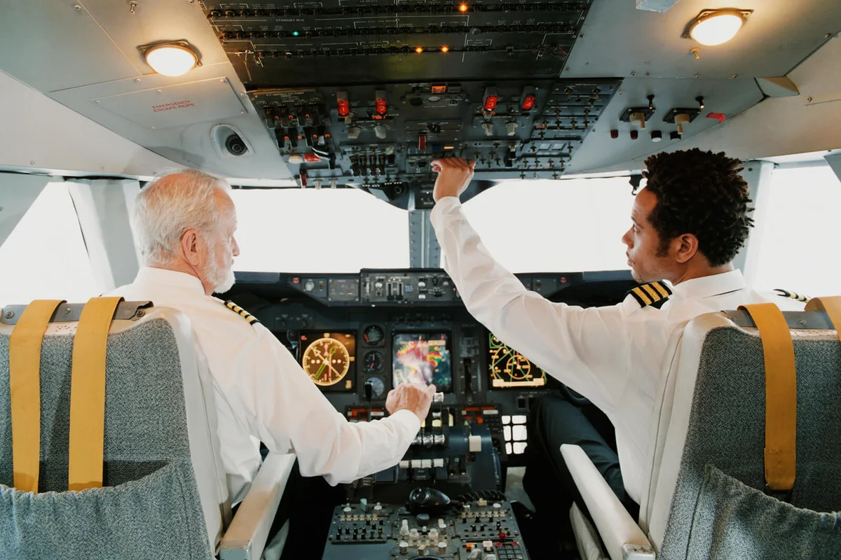 Portrait of Pilots Sitting in the Cockpit