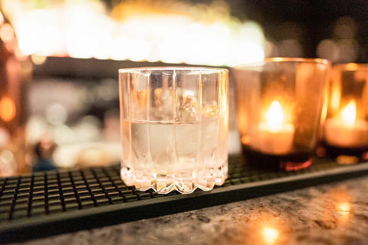 Glass of pineapple clarified milk punch