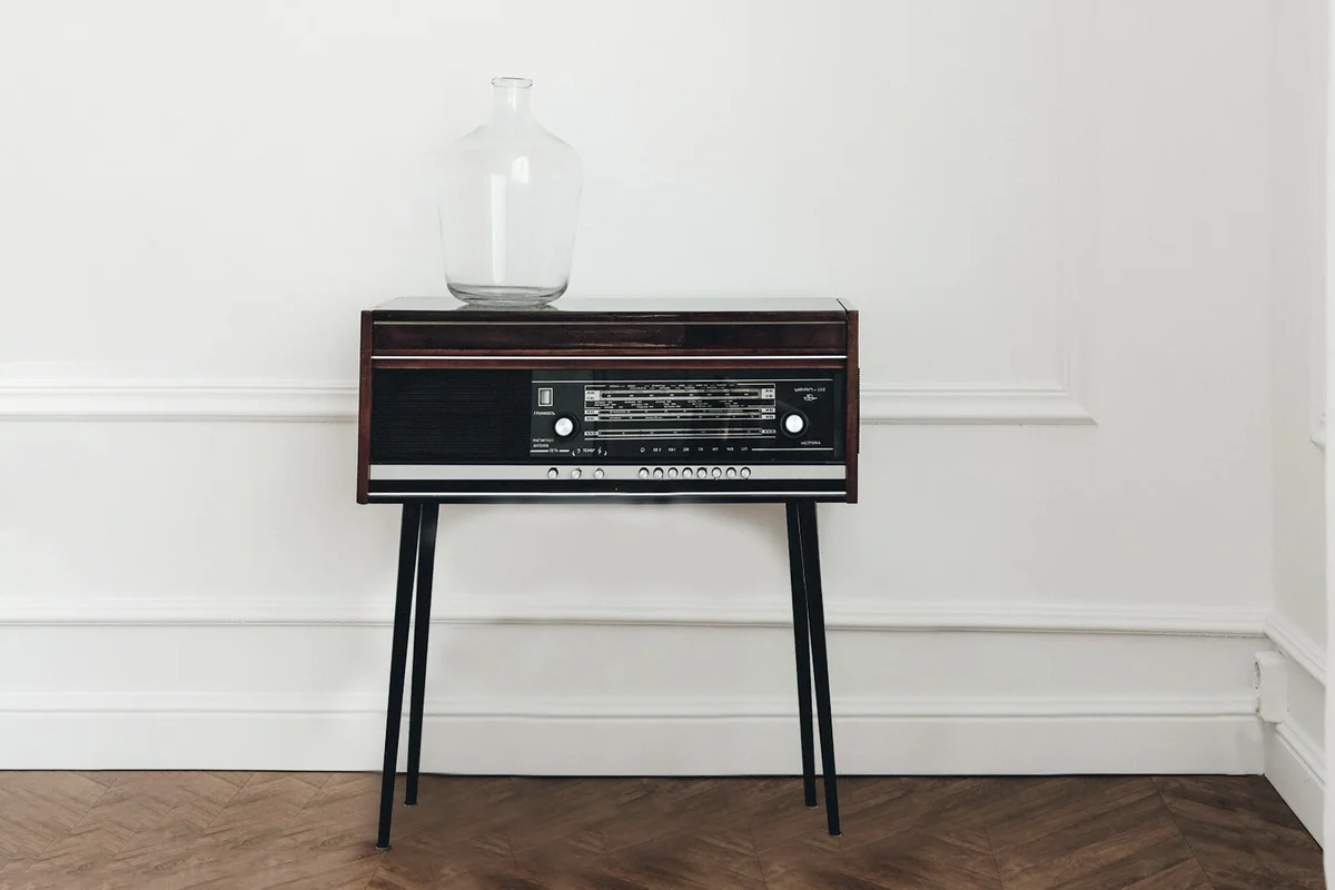 Radio cabinet repurposed into a side table