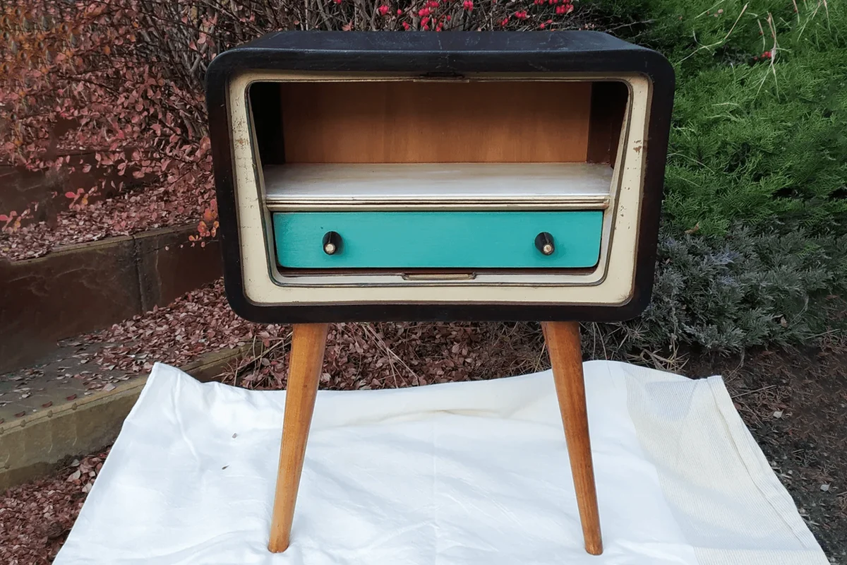 Old radio cabinet repurposed into a night stand