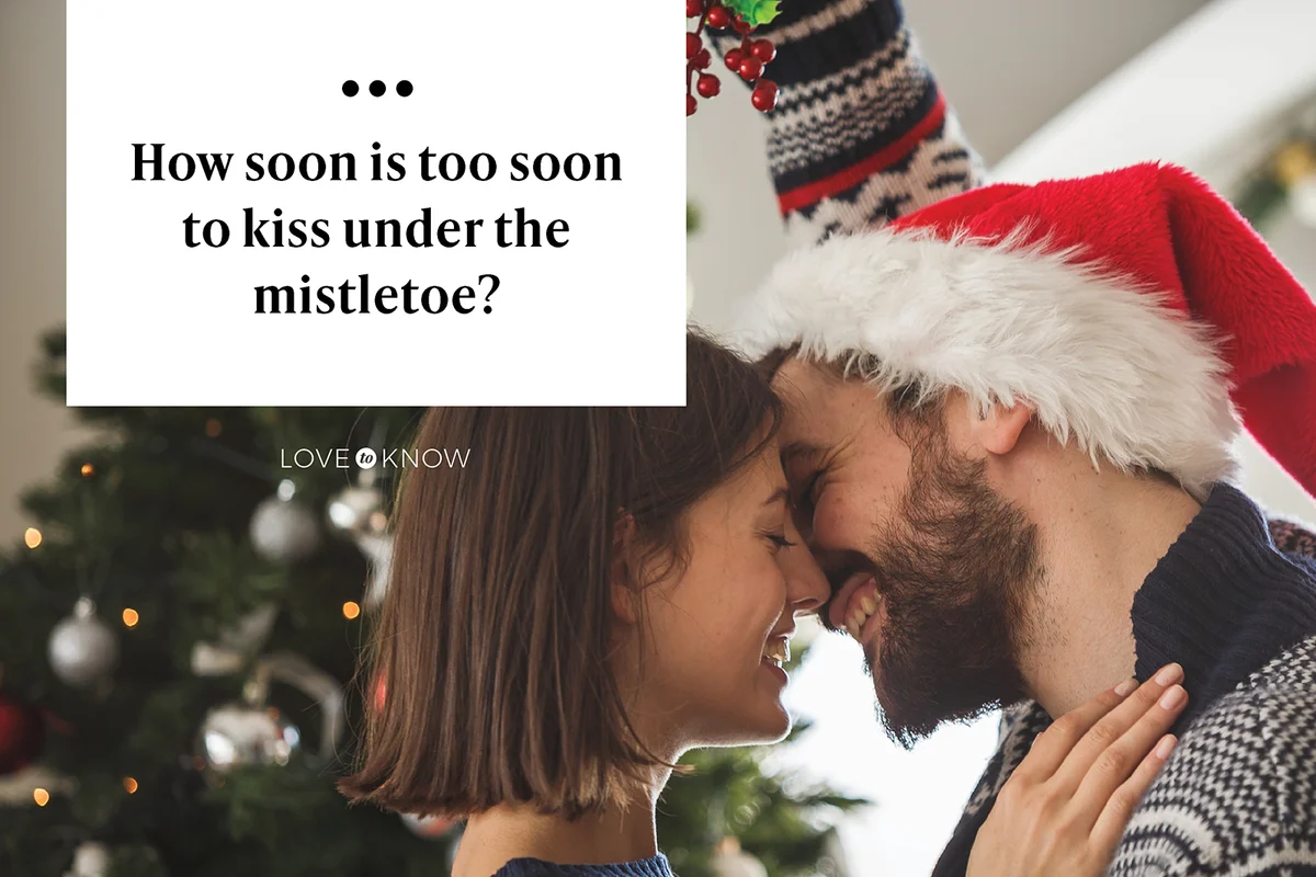 Happy couple under the mistletoe