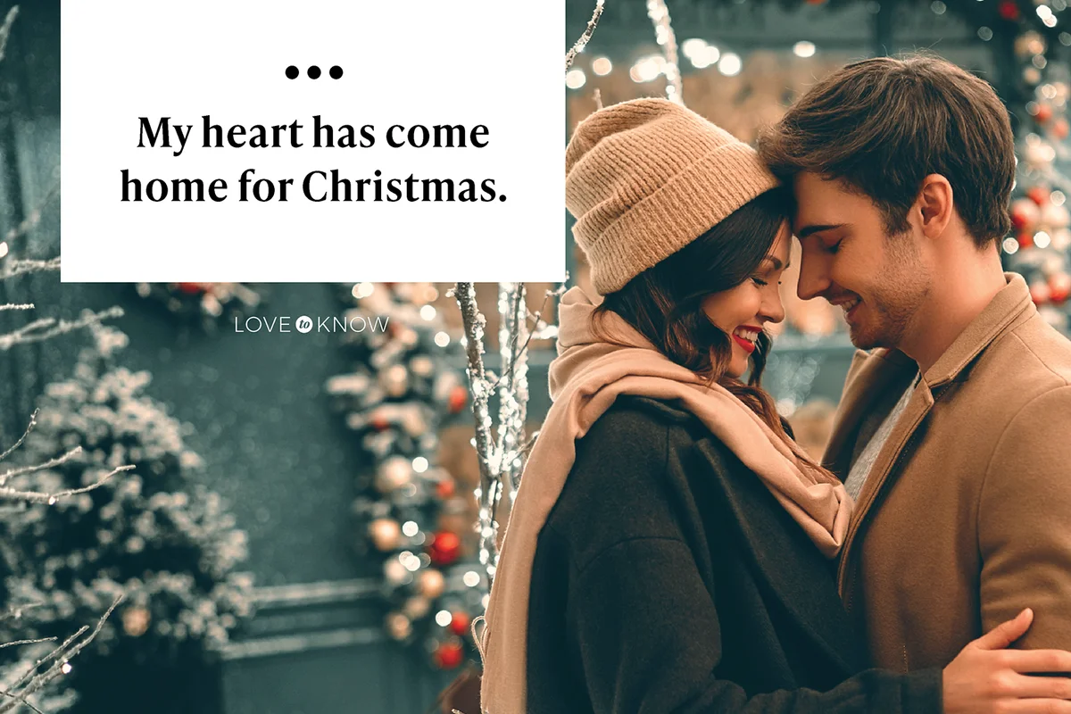 Young romantic couple having fun outdoors in winter before Christmas