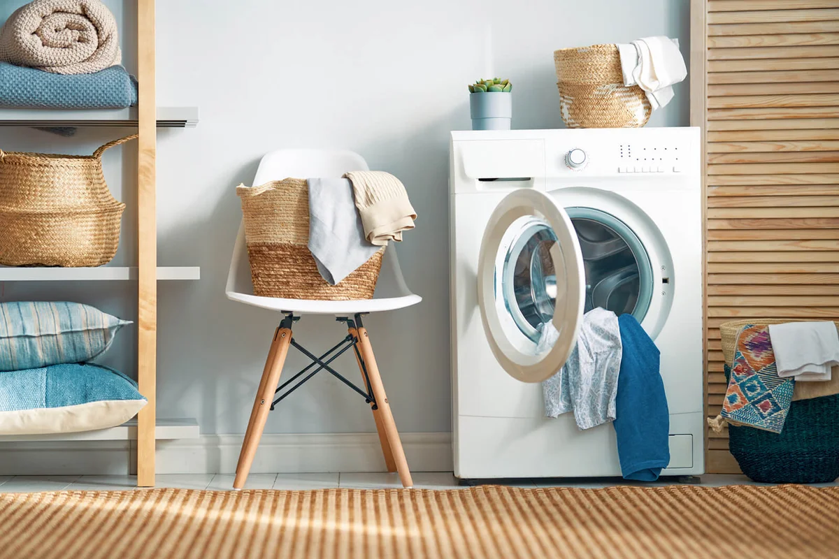 Laundry room with a washing machine