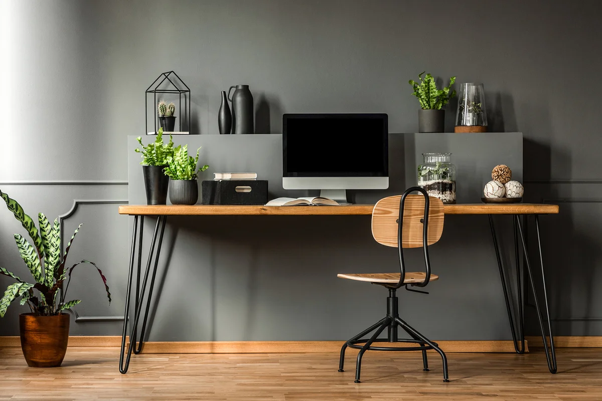 Small home office decorated in deep charcoal color