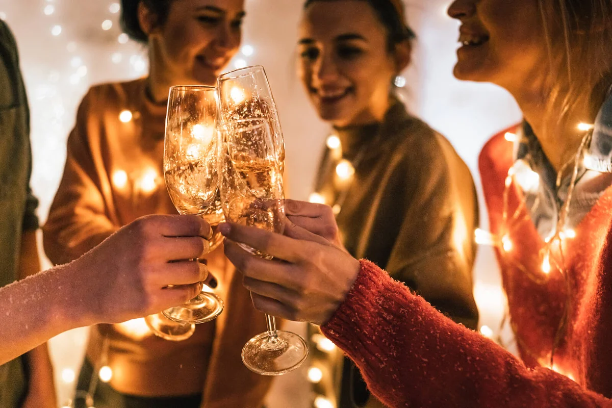 small group of friends toasting with champagne
